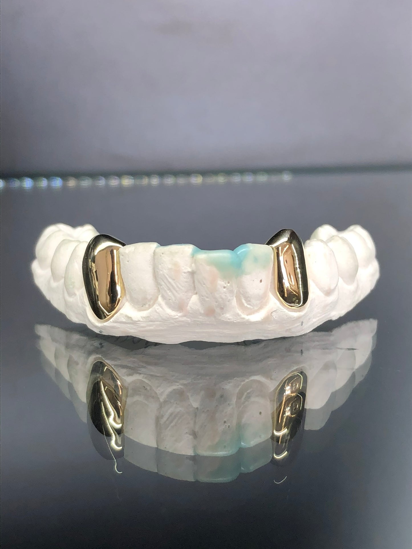 2 Teeth Gold Grillz - 2 Bottom Fangs w/ Back Bridge
